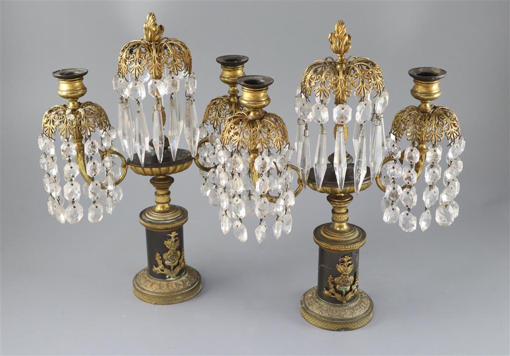 A pair of Regency bronze and ormolu lustre candelabra, height 14in.